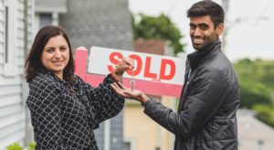 man and woman with key